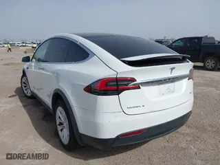 2018 Tesla Model X 75D with VIN 5YJXCBE26JF140049, listed as a IAAI auction lot 41712865 with 48,684 mi miles. Bid and sale history available at carsss.com. Image 3.