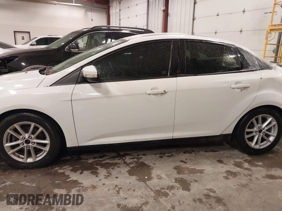2015 Ford Focus SE with VIN 1FADP3F26FL253926, listed as a IAAI auction lot 41947476 with 86,254 mi miles and . Bid and sale history available at carsss.com. Image 14.