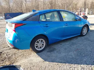 2020 Toyota Prius L Eco with VIN JTDKARFU2L3117344, listed as a IAAI auction lot 41613442 with 64,902 mi miles. Bid and sale history available at carsss.com. Image 4.