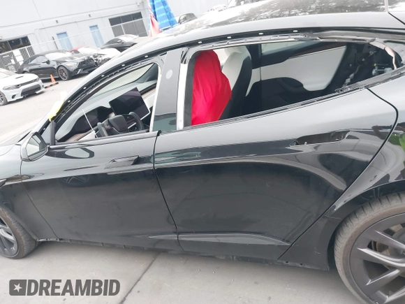 2022 Tesla Model S with VIN 5YJSA1E55NF474342, listed as a IAAI auction lot 41870994 with 33,804 mi miles and . Bid and sale history available at DreamBid. Image 15.