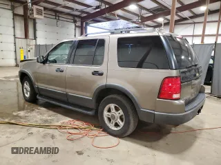 2003 Ford Explorer XLT with VIN 1FMZU73W03UA58560, listed as a Copart auction lot 87354824 with 157,052 mi miles and Salvage title. Bid and sale history available at DreamBid. Image 2.