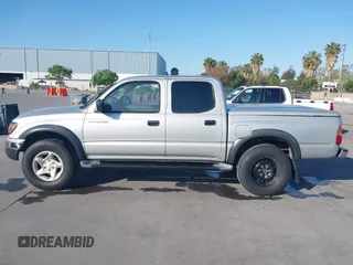 2003 Toyota Tacoma PreRunner z VIN 5TEGN92N63Z152916, wystawiony jako IAAI lot #42153765 z przebiegiem 229 221 mil mil oraz . Historia ofert i sprzedaży dostępna na DreamBid. Obrazek 14.