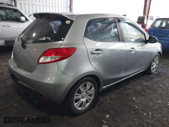 2013 Mazda 2 Sport with VIN JM1DE1KY1D0167999, listed as a IAAI auction lot 41713546 with 204,443 mi miles and . Bid and sale history available at DreamBid. Image 4.