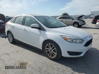 2015 Ford Focus SE with VIN 1FADP3F2XFL220072, listed as a Copart auction lot 58058255 with 128,871 mi miles and Clean title. Bid and sale history available at DreamBid. Image 4.