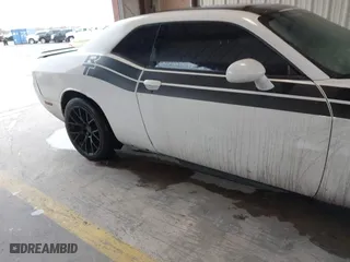2011 Dodge Challenger with VIN 2B3CJ4DGXBH558348, listed as a IAAI auction lot 41532603 with 127,551 mi miles. Bid and sale history available at carsss.com. Image 6.