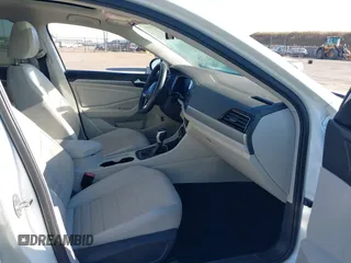 2024 Volkswagen Jetta SE with VIN 3VW7M7BU2RM031902, listed as a IAAI auction lot 42205832 with 31,274 mi miles and . Bid and sale history available at DreamBid. Image 5.
