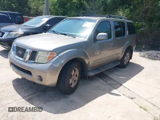 2006 Nissan Pathfinder SE with VIN 5N1AR18U46C670001, listed as a IAAI auction lot 42451015 with 292,292 mi miles and . Bid and sale history available at DreamBid. Image 2.