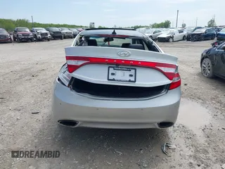 2013 Hyundai Azera z VIN KMHFH4JG5DA225239, wystawiony jako IAAI lot #42166107 z przebiegiem 118 350 mil mil oraz . Historia ofert i sprzedaży dostępna na DreamBid. Obrazek 16.