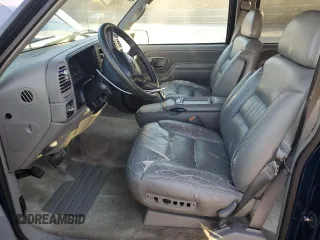 1999 Chevrolet Suburban with VIN 3GNEC16R3XG257322, listed as a Copart auction lot 77601224 with 196,923 mi miles and Salvage Title. Bid and sale history available at carsss.com. Image 7.