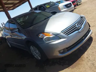 2009 Nissan Altima S z VIN 1N4AL21E19N499107, wystawiony jako IAAI lot #42313141 z przebiegiem 95 317 mil mil oraz . Historia ofert i sprzedaży dostępna na DreamBid. Obrazek 1.