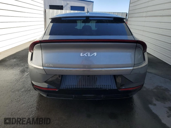 2023 Kia EV6 Wind with VIN KNDC34LA4P5602784, listed as a Copart auction lot 79891544 with 74,787 mi miles and Clean Title. Bid and sale history available at carsss.com. Image 6.