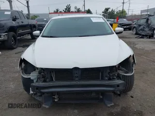2015 Volkswagen Passat 1.8T SE w/Sunroof & Nav with VIN 1VWBT7A31FC043798, listed as a IAAI auction lot 42108289 with 132,442 mi miles. Bid and sale history available at carsss.com. Image 6.