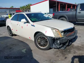2009 Cadillac CTS RWD z VIN 1G6DF577190106800, wystawiony jako IAAI lot #42316470 z przebiegiem 147 836 mil mil oraz . Historia ofert i sprzedaży dostępna na DreamBid. Obrazek 1.