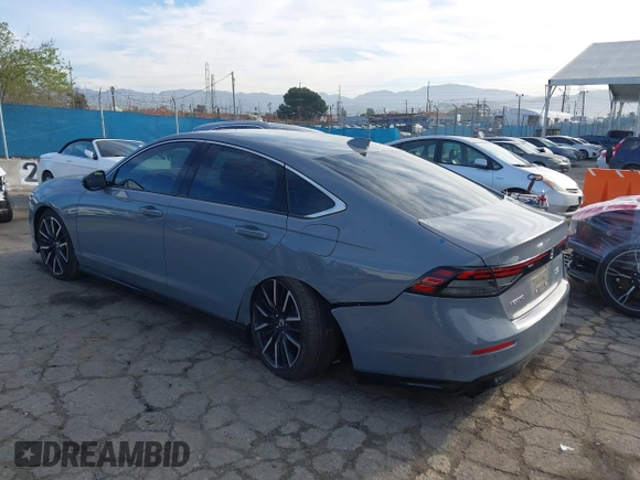 2023 Honda Accord Touring with VIN 1HGCY2F81PA035053, listed as a IAAI auction lot 41807628 with 57,422 mi miles and . Bid and sale history available at DreamBid. Image 3.