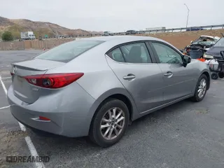2015 Mazda Mazda3 i Touring with VIN 3MZBM1V76FM163456, listed as a IAAI auction lot 41449841 with 77,686 mi miles. Bid and sale history available at carsss.com. Image 4.