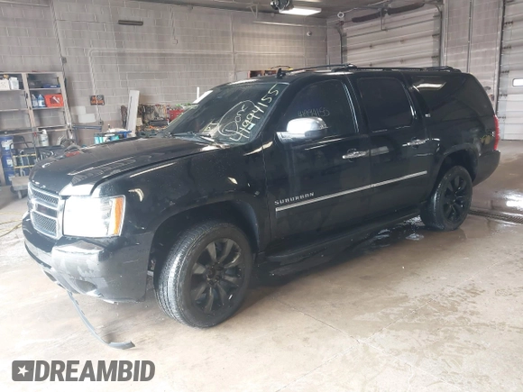 2010 Chevrolet Suburban LTZ with VIN 1GNUKKE39AR106851, listed as a IAAI auction lot 41994155 with 148,776 mi miles. Bid and sale history available at carsss.com. Image 2.