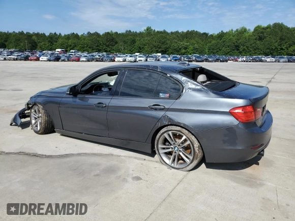 2012 BMW 3 Series 335i with VIN WBA3A9C5XCF474803, listed as a Copart auction lot 57940675 with 121,960 mi miles and Salvage title. Bid and sale history available at DreamBid. Image 2.