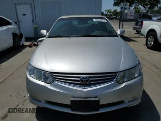 2002 Toyota Solara SE z VIN 2T1CF28P62C575561, wystawiony jako Copart lot #59748025 z przebiegiem 108 748 mil mil oraz Szkoda całkowita • Salvage title. Historia ofert i sprzedaży dostępna na DreamBid. Obrazek 5.