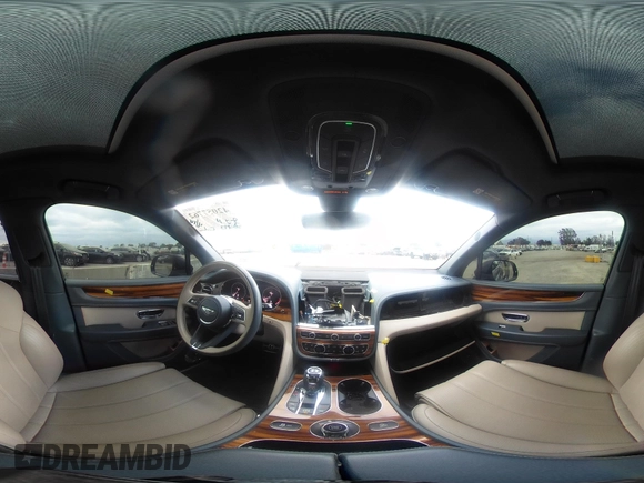 2021 Bentley Bentayga V8 z VIN SJAAM2ZV5MC038171, wystawiony jako IAAI lot #42057762 z przebiegiem 25 973 mil mil oraz . Historia ofert i sprzedaży dostępna na DreamBid. Obrazek 19.
