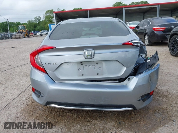 2019 Honda Civic LX with VIN 19XFC2F60KE043806, listed as a IAAI auction lot 41915894 with 123,141 mi miles and . Bid and sale history available at DreamBid. Image 17.