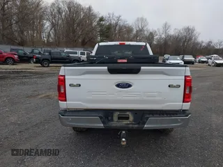 2021 Ford F-150 XL с VIN 1FTFX1E5XMKD25149, выставлен на аукционе IAAI как лот 41524584 с пробегом 105 883 миль миль и . История ставок и продаж доступна на DreamBid. Изображение 16.