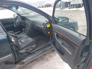 1999 Volvo S80 with VIN YV1TS90D5X1014909, listed as a IAAI auction lot 41644130 with 127,240 mi miles. Bid and sale history available at carsss.com. Image 5.