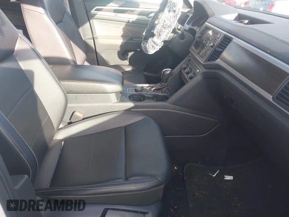 2021 Volkswagen Atlas SE with VIN 1V2HR2CA8MC575779, listed as a IAAI auction lot 42542070 with 84,849 mi miles and . Bid and sale history available at DreamBid. Image 5.