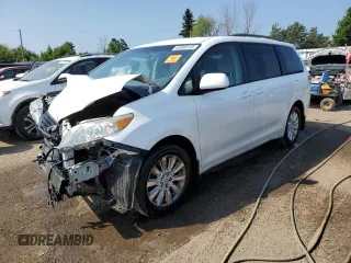 2014 Toyota Sienna LE with VIN 5TDJK3DC8ES072055, listed as a Copart auction lot 64056145 with Not provided miles and Salvage title. Bid and sale history available at DreamBid. Image 1.