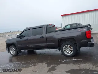 2015 Chevrolet Silverado 1500 LT with VIN 3GCUKREC6FG155529, listed as a IAAI auction lot 41821751 with 157,419 mi miles. Bid and sale history available at carsss.com. Image 14.