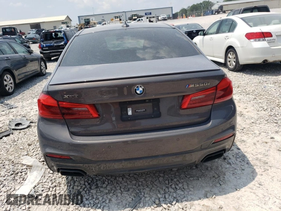 2020 BMW 5 Series M550i xDrive with VIN WBAJS7C08LCD82431, listed as a Copart auction lot 59518835 with 33,184 mi miles and Salvage title. Bid and sale history available at DreamBid. Image 6.