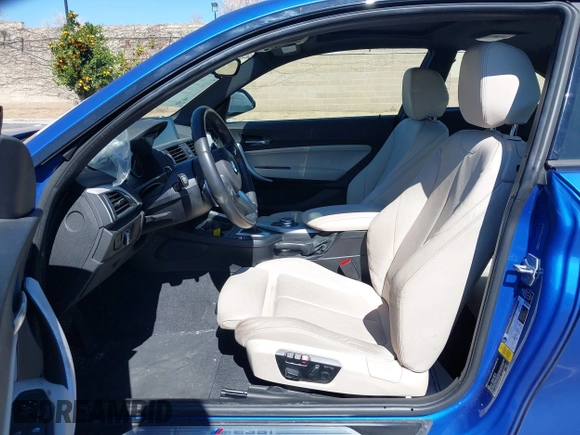 2015 BMW 2 Series M235i with VIN WBA1J7C59FV254140, listed as a IAAI auction lot 41642427 with 23,957 mi miles and . Bid and sale history available at carsss.com. Image 5.