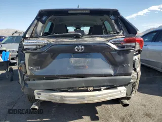 2020 Toyota RAV4 XLE with VIN 2T3W1RFV8LW070246, listed as a Copart auction lot 65072185 with 61,339 mi miles and Salvage title. Bid and sale history available at DreamBid. Image 6.
