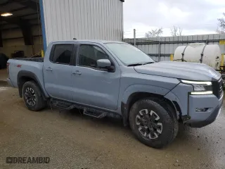 2023 Nissan Frontier PRO-4X with VIN 1N6ED1EK9PN622424, listed as a Copart auction lot 88164565 with 23,212 mi miles and Salvage Title. Bid and sale history available at carsss.com. Image 4.