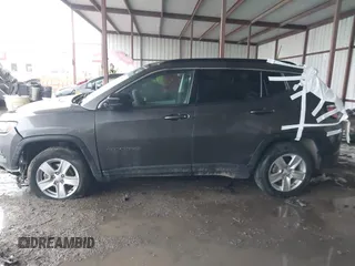 2022 Jeep Compass Latitude with VIN 3C4NJDBB1NT223599, listed as a IAAI auction lot 42181714 with 52,071 mi miles and . Bid and sale history available at DreamBid. Image 14.