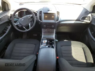 2019 Ford Edge SEL z VIN 2FMPK3J9XKBC19570, wystawiony jako Copart lot #55272125 z przebiegiem 69 602 mil mil oraz Szkoda całkowita • Salvage title. Historia ofert i sprzedaży dostępna na DreamBid. Obrazek 8.
