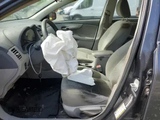 2009 Toyota Corolla with VIN 2T1BU40E69C140217, listed as a Copart auction lot 52199345 with 105,505 mi miles and Salvage Title. Bid and sale history available at carsss.com. Image 7.