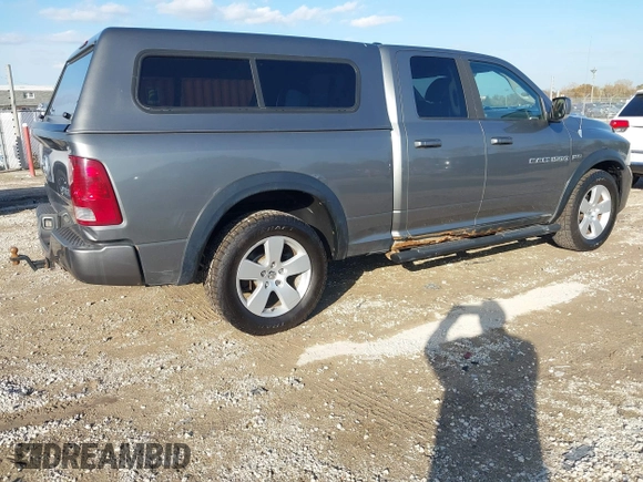 2011 Ram 1500 ST with VIN 1D7RV1GTXBS556473, listed as a IAAI auction lot 40711248 with 210,581 mi miles. Bid and sale history available at carsss.com. Image 4.