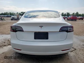 2023 Tesla Model 3 with VIN 5YJ3E1EA1PF550454, listed as a Copart auction lot 58985695 with 19,199 mi miles and Salvage title. Bid and sale history available at DreamBid. Image 6.