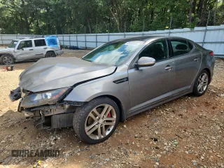 2013 Kia Optima SX with VIN 5XXGR4A6XDG215811, listed as a Copart auction lot 63088255 with 273,802 mi miles and Salvage title. Bid and sale history available at DreamBid. Image 1.