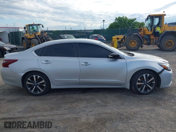 2017 Nissan Altima S z VIN 1N4AL3AP3HC116799, wystawiony jako IAAI lot #41577016 z przebiegiem 168 207 mil mil oraz . Historia ofert i sprzedaży dostępna na DreamBid. Obrazek 12.