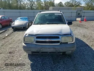 2003 Chevrolet Tracker z VIN 2CNBE13C736912038, wystawiony jako Copart lot #80422844 z przebiegiem 242 512 mil mil oraz Szkoda całkowita • Salvage title. Historia ofert i sprzedaży dostępna na DreamBid. Obrazek 11.