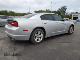 2012 Dodge Charger SE with VIN 2C3CDXBG4CH203207, listed as a Copart auction lot 56910395 with 156,016 mi miles and Salvage Title. Bid and sale history available at DreamBid. Image 3.