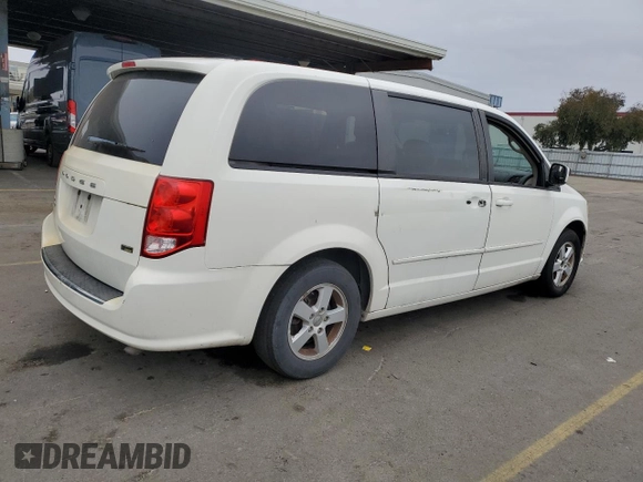 2012 Dodge Grand Caravan SXT with VIN 2C4RDGCG6CR204681, listed as a Copart auction lot 80799044 with 183,195 mi miles and Salvage Title. Bid and sale history available at DreamBid. Image 3.
