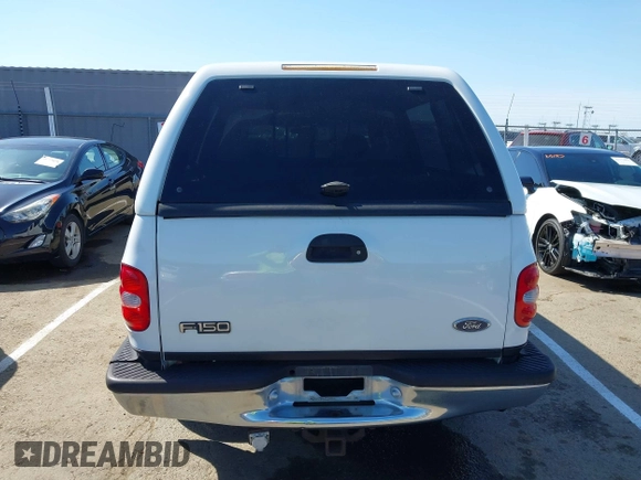 1998 Ford F-150 XL with VIN 1FTZX072XWKA12003, listed as a IAAI auction lot 41765328 with 119,445 mi miles and . Bid and sale history available at DreamBid. Image 16.