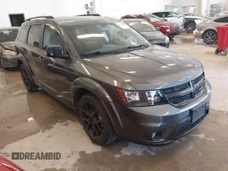 2014 Dodge Journey SXT with VIN 3C4PDCBB6ET151356, listed as a IAAI auction lot 41696752 with 101,728 mi miles. Bid and sale history available at carsss.com. Image 1.