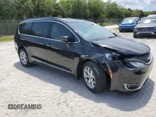2017 Chrysler Pacifica Touring L with VIN 2C4RC1BG7HR551641, listed as a Copart auction lot 51810185 with 66,860 mi miles and Salvage Title. Bid and sale history available at DreamBid. Image 4.
