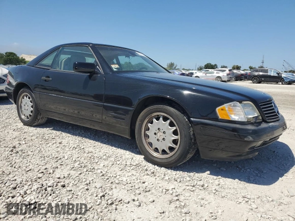 1997 Mercedes-Benz SL 500 z VIN WDBFA63F4VF151890, wystawiony jako Copart lot #53715385 z przebiegiem 165 459 mil mil oraz Czysty tytuł • Clean title. Historia ofert i sprzedaży dostępna na DreamBid. Obrazek 4.