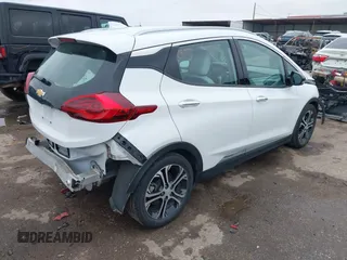 2018 Chevrolet Bolt EV Premier with VIN 1G1FX6S02J4133190, listed as a IAAI auction lot 41363945 with 57,228 mi miles. Bid and sale history available at carsss.com. Image 4.