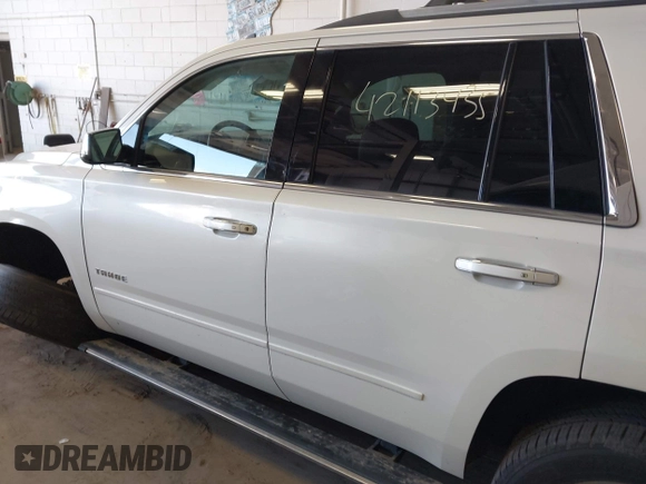2015 Chevrolet Tahoe LTZ with VIN 1GNSKCKC9FR123996, listed as a IAAI auction lot 42113435 with 149,825 mi miles and . Bid and sale history available at DreamBid. Image 14.