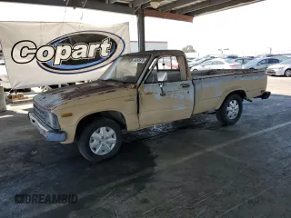 1982 Toyota Pickup with VIN JT4RN44DXC0084359, listed as a Copart auction lot 64345975 with 332,485 mi miles and Salvage title. Bid and sale history available at DreamBid. Image 1.
